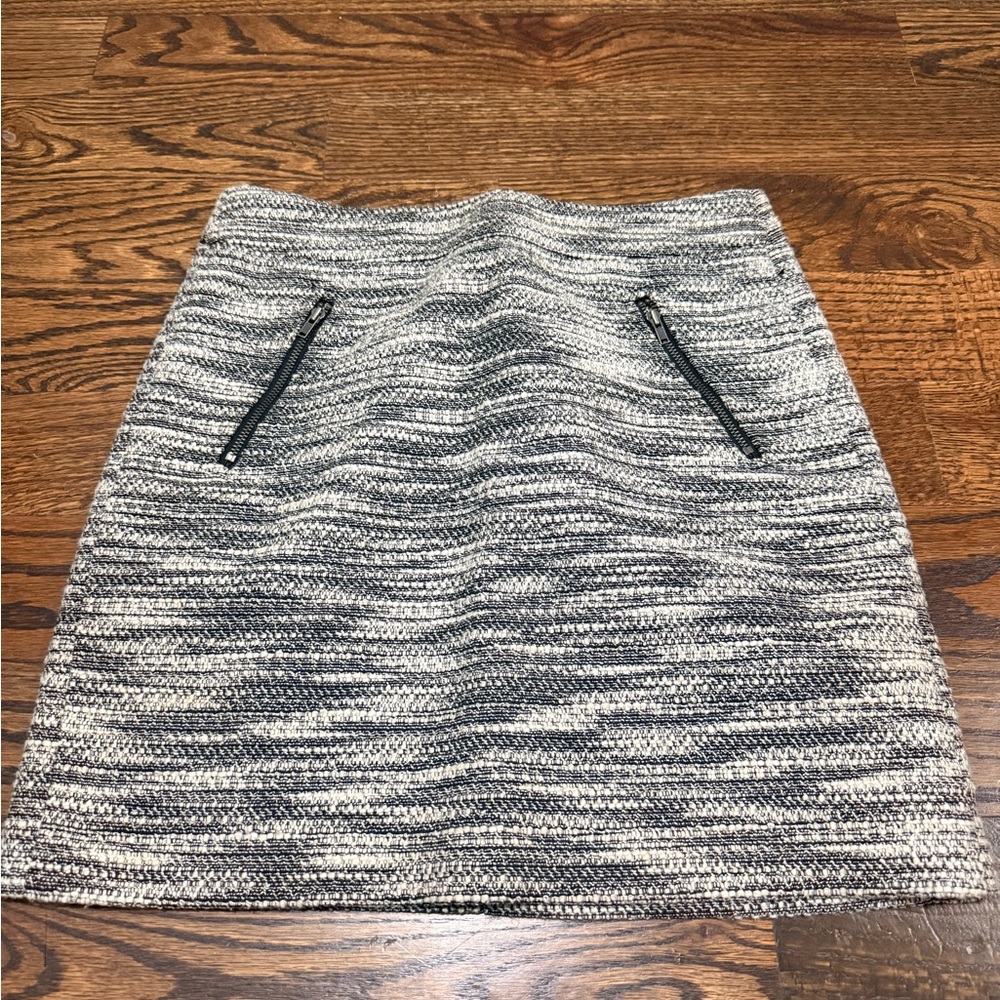 Loft A-line skirt. Black and white tweed. Zipper pockets. Size 0 Petite.